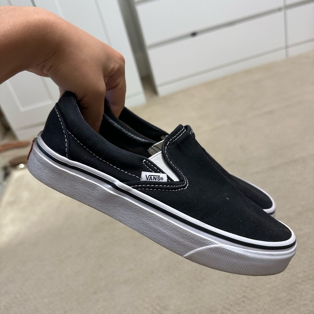 Vans Black and White Slip-On Sneakers